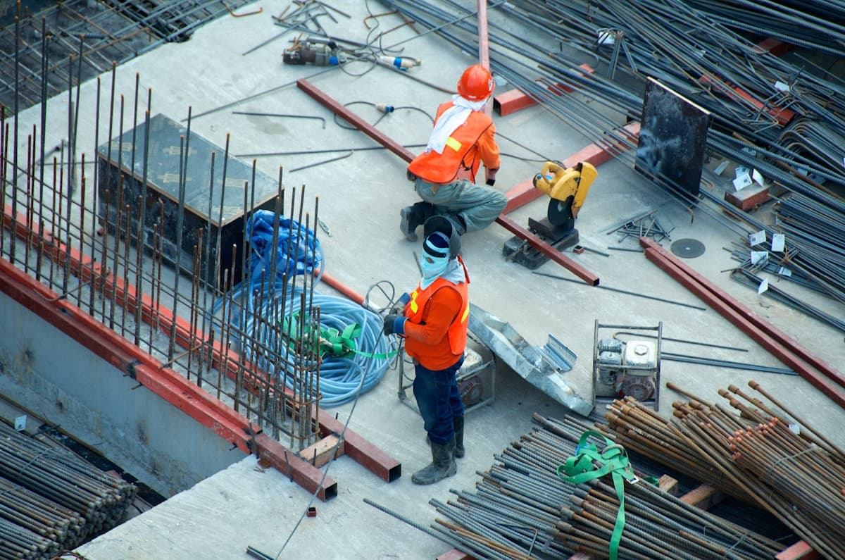 Construction site with cranes and building progress